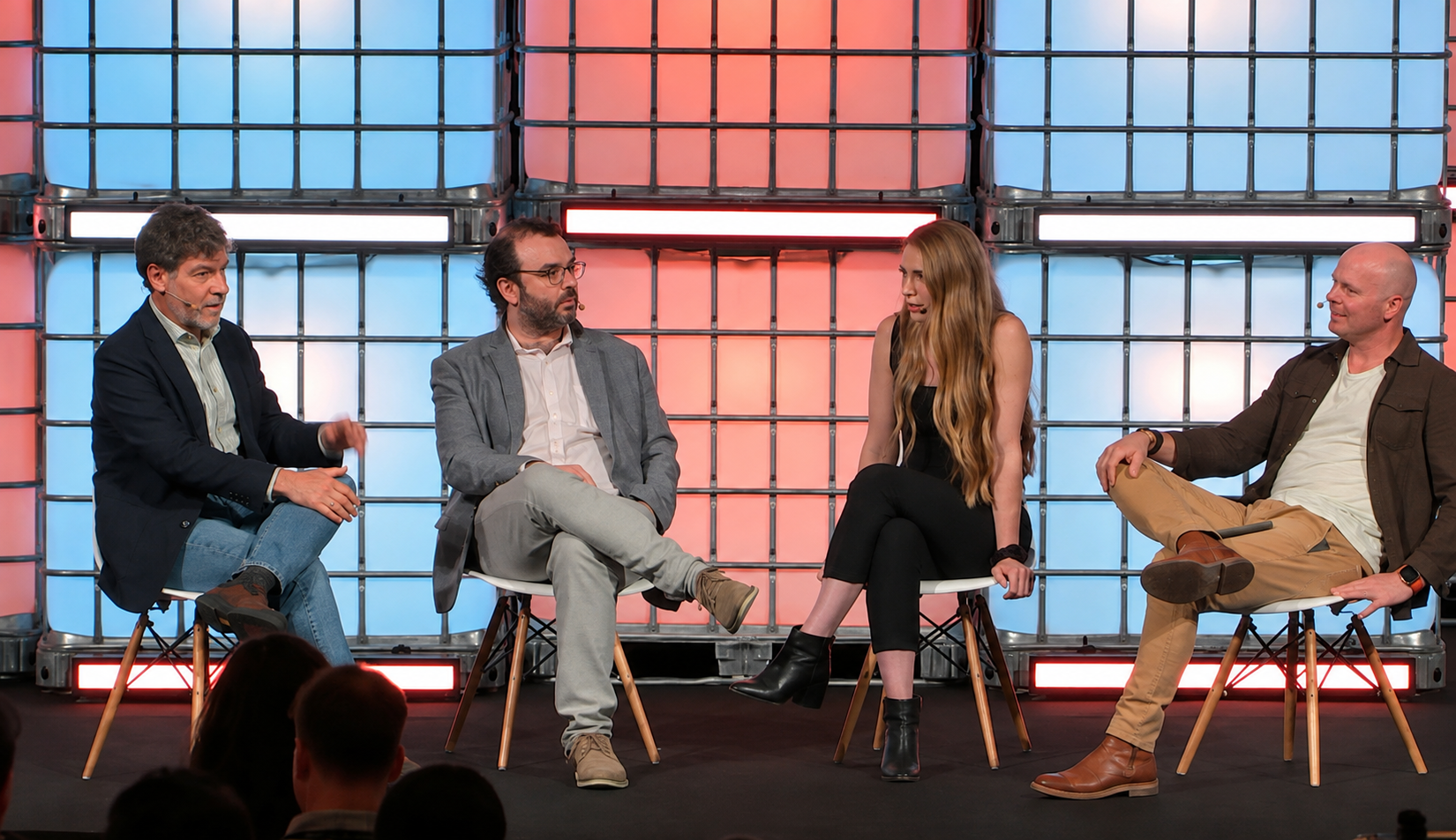 Lauren on stage at a panel discussion